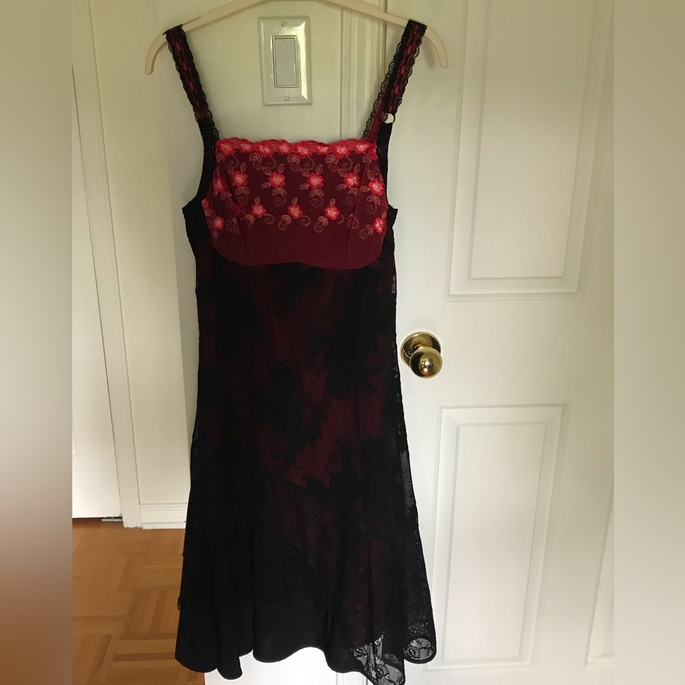 Kollontai black and red slip lace dress.